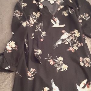 Beautiful short black dress with hummingbirds .